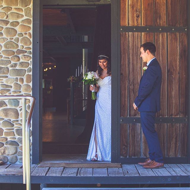 A beautiful little moment split seconds before Priyanka &amp; Matt saw one another on their wedding day.
___

#firstlook #weddingday #narrowslanding #wedinwaikato #waikatowedding #waikatoweddingphotographer #nzbrideandgroom #kiwiwedding #sequindress 